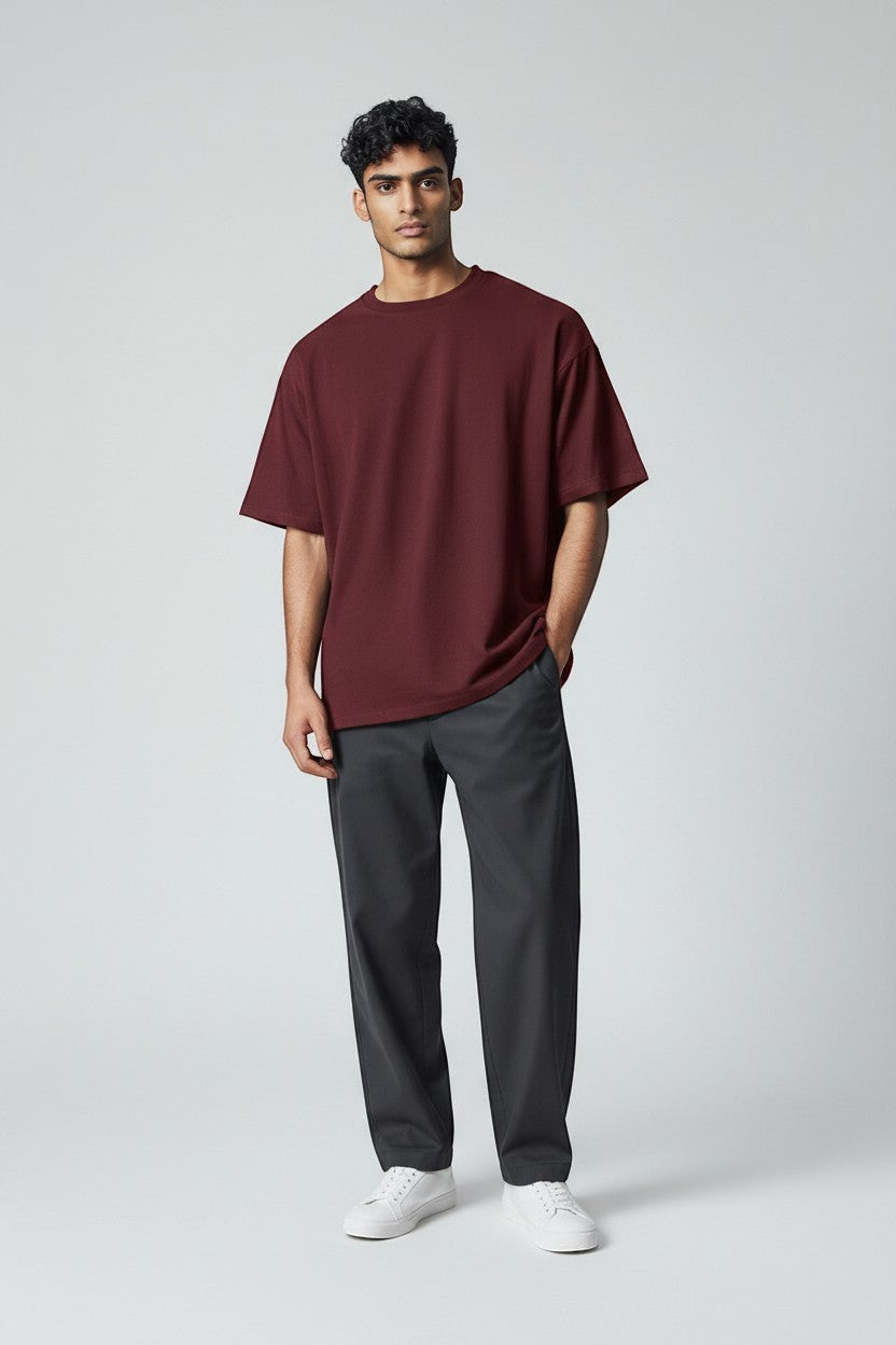 LowKeyLoud unisex oversized t-shirt in deep maroon cotton with a crew neck and short sleeves.